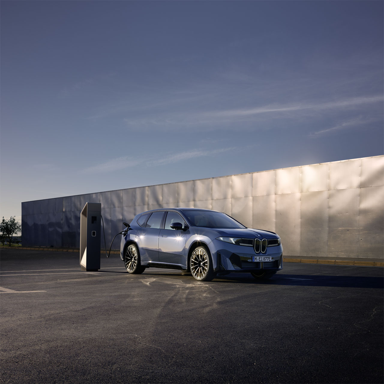 BMW i3 electric SUV, compact and eco-friendly, depicted in an urban setting with natural elements.