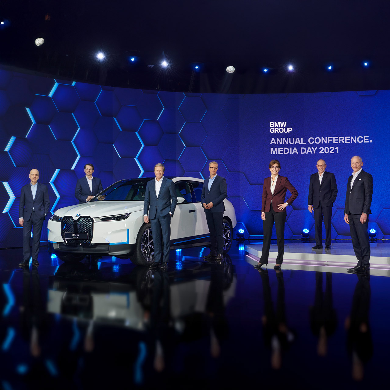 The board members of the BMW Group standing on a stage announcing the Neue Klasse for 2025