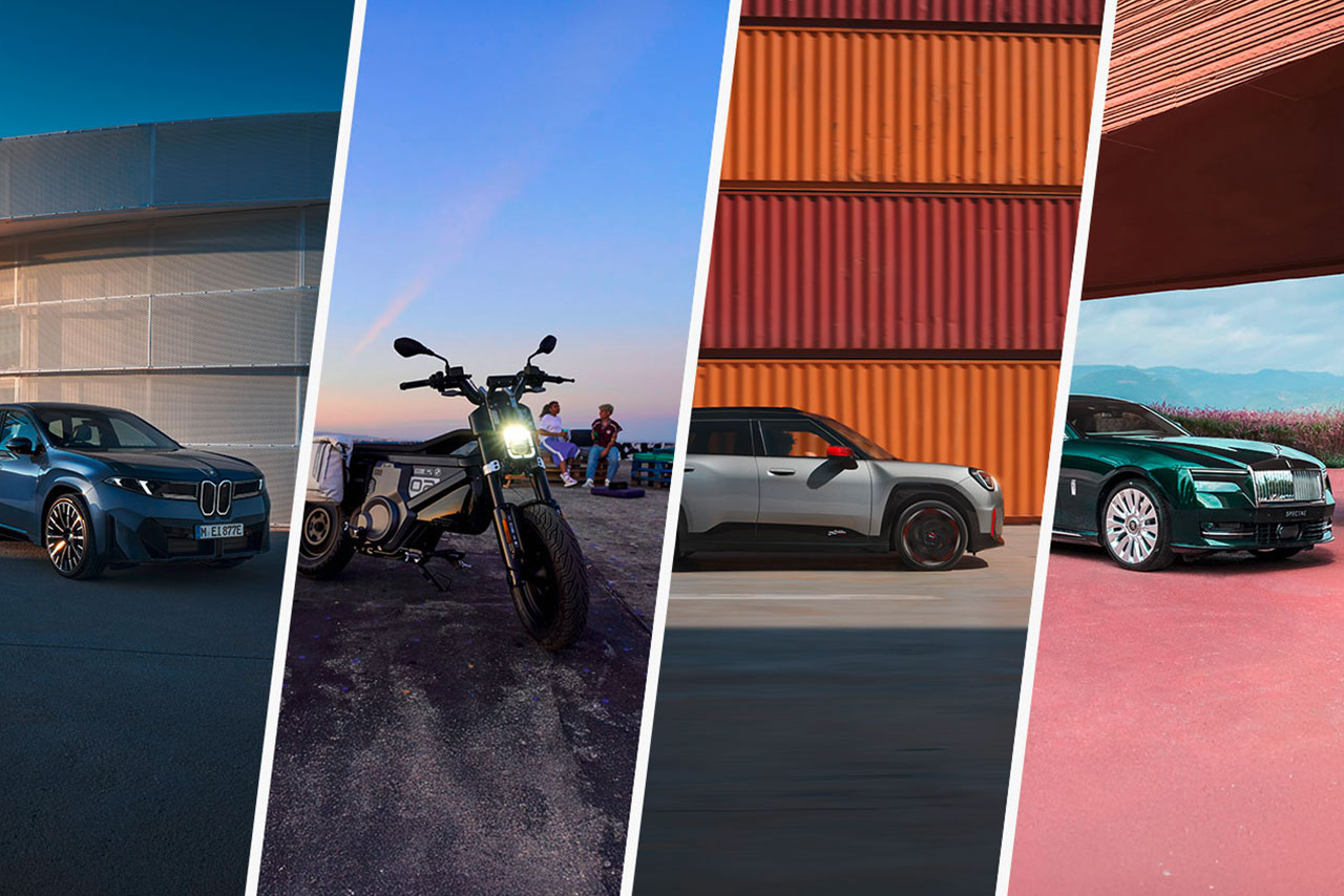 Six different electrified BMW vehicles are positioned infront of the mountains