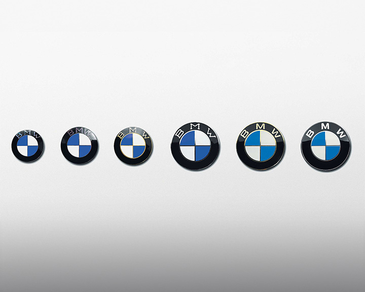 BMW logos storted from oldest on the left to newest on the right.