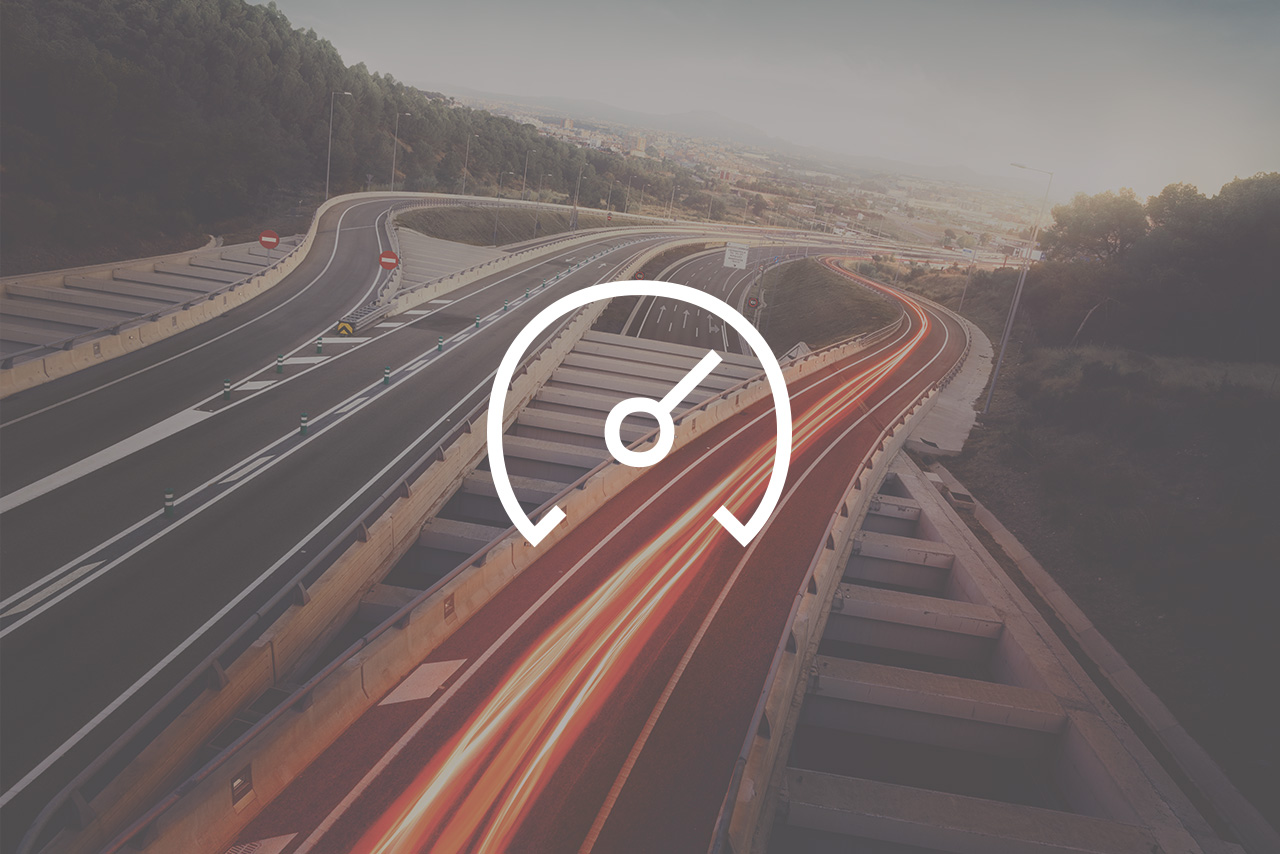 Speedometer overlay on a highway at dusk