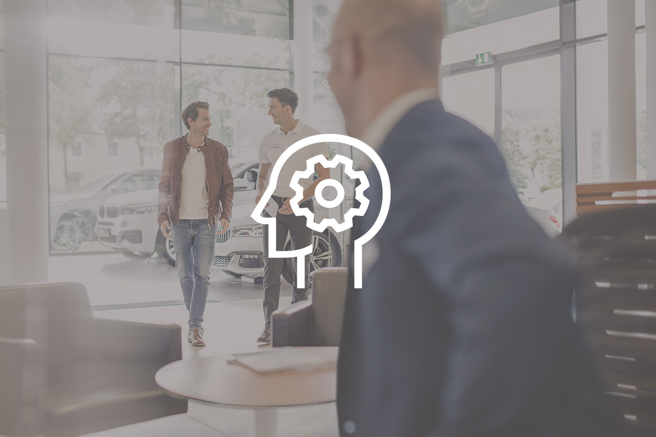 A teamwork concept featuring a brain icon with a gear wheel symbolizing collaboration and creativity.