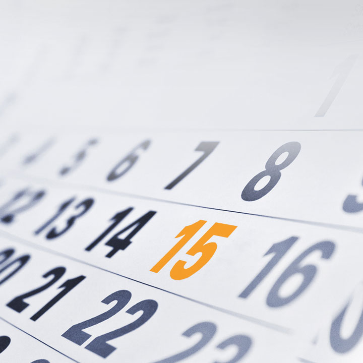 Section of a calendar page with the number 15 highlighted in orange; surrounding numbers shown in black.